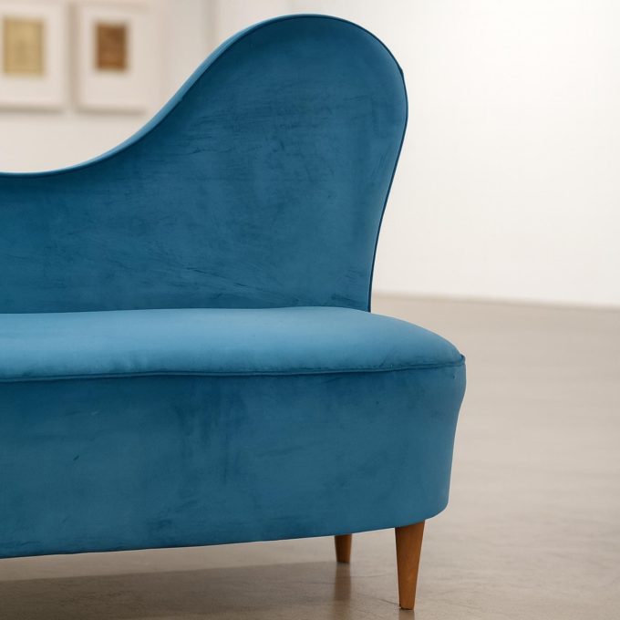Two-seater sofa by Cesare Lacca in turquoise velvet, three-quarter view.