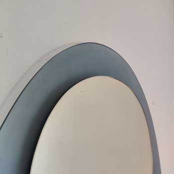 Detail of the upper part of the Veca mirror, ground glass finish