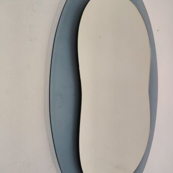 Side view of the 1970s Veca mirror, curved profile in blue glass
